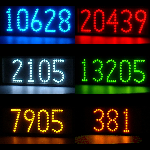 Horizontal lighted house numbers showing LED colors